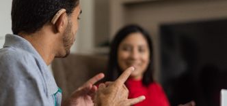 BSL user communicating with a researcher